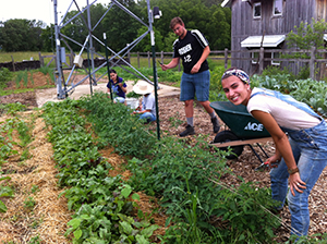 Students at the Merry Lea sustainable farm in Indiana are seen working at the “kitchen farm”. (photo courtesy of Jon Zirkle/Merry Lea Environmental Learning Center)